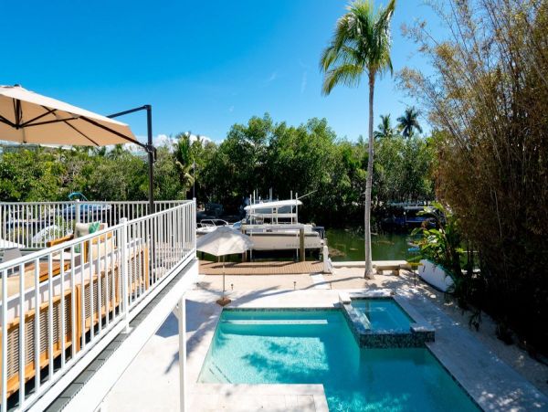 Only One Block to Beach Three Bedroom Vacation Home with Pool
