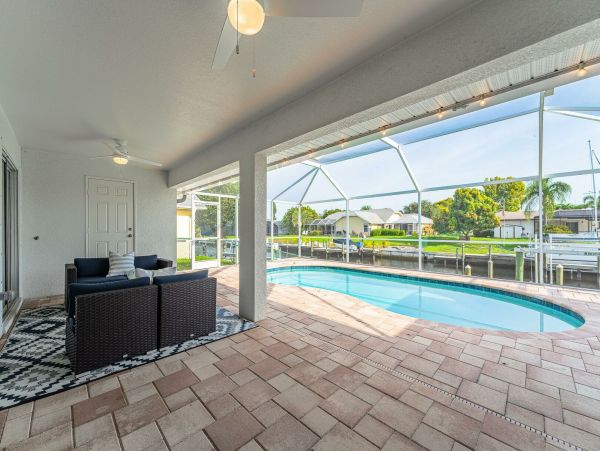 Charming Gulf Access Retreat with Pool and Scenic Canal Views