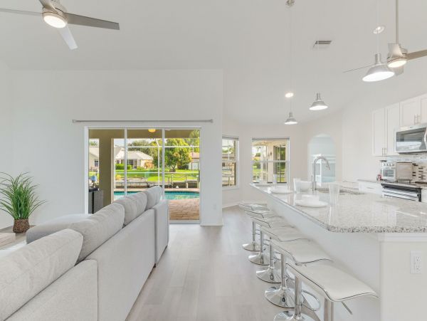 Charming Gulf Access Retreat with Pool and Scenic Canal Views