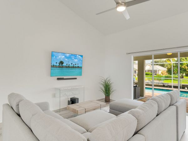 Charming Gulf Access Retreat with Pool and Scenic Canal Views
