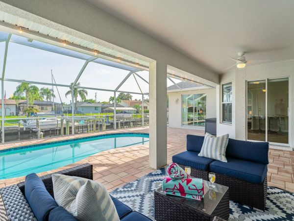 Charming Gulf Access Retreat with Pool and Scenic Canal Views