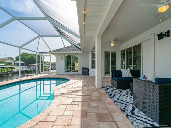 Charming Gulf Access Retreat with Pool and Scenic Canal Views