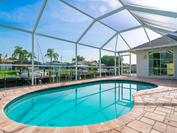 Charming Gulf Access Retreat with Pool and Scenic Canal Views