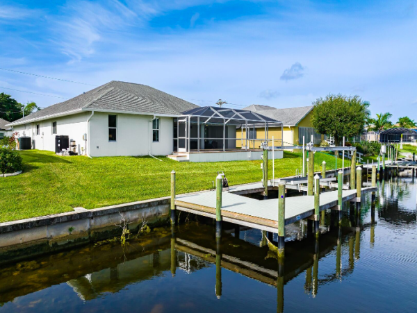 Charming Gulf Access Retreat with Pool and Scenic Canal Views