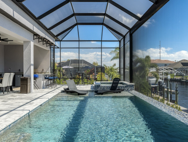 Canal Front 3 Bedroom + Kids Room Home with Pool-Spa & Boat Dock in Cape Coral
