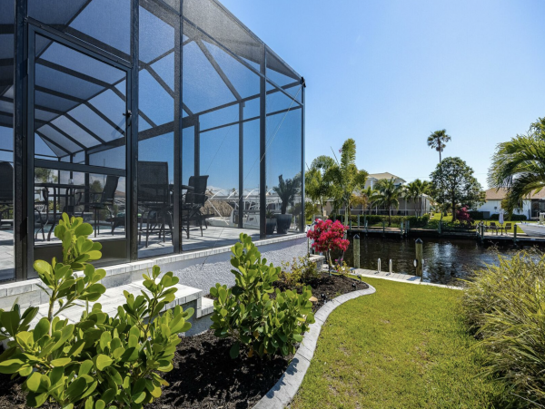 Canal Front 3 Bedroom + Kids Room Home with Pool-Spa & Boat Dock in Cape Coral