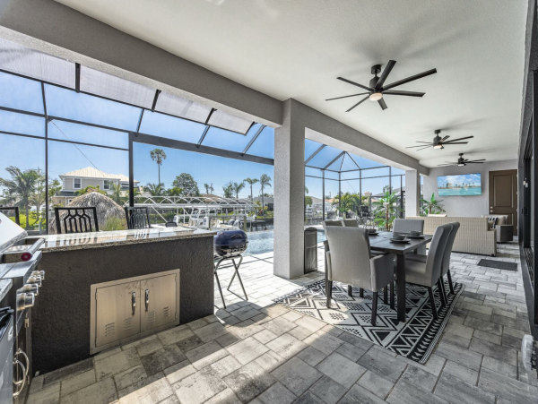 Canal Front 3 Bedroom + Kids Room Home with Pool-Spa & Boat Dock in Cape Coral