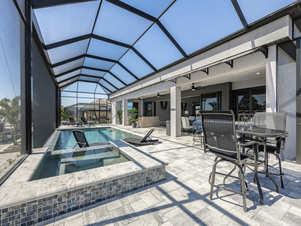 Canal Front 3 Bedroom + Kids Room Home with Pool-Spa & Boat Dock in Cape Coral