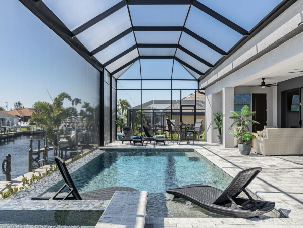 Canal Front 3 Bedroom + Kids Room Home with Pool-Spa & Boat Dock in Cape Coral