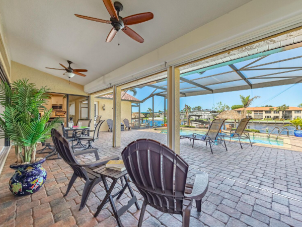 Canal Front Retreat with Gulf Access, Pool, and Tiki Dock in Cape Coral