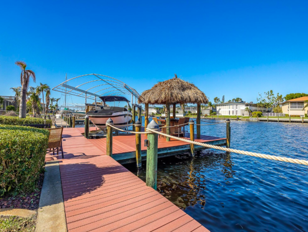 Canal Front Retreat with Gulf Access, Pool, and Tiki Dock in Cape Coral