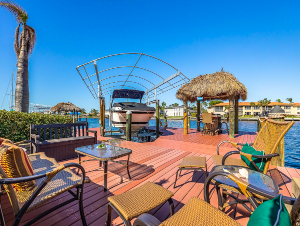 Canal Front Retreat with Gulf Access, Pool, and Tiki Dock in Cape Coral