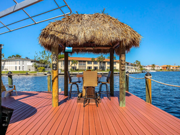 Canal Front Retreat with Gulf Access, Pool, and Tiki Dock in Cape Coral