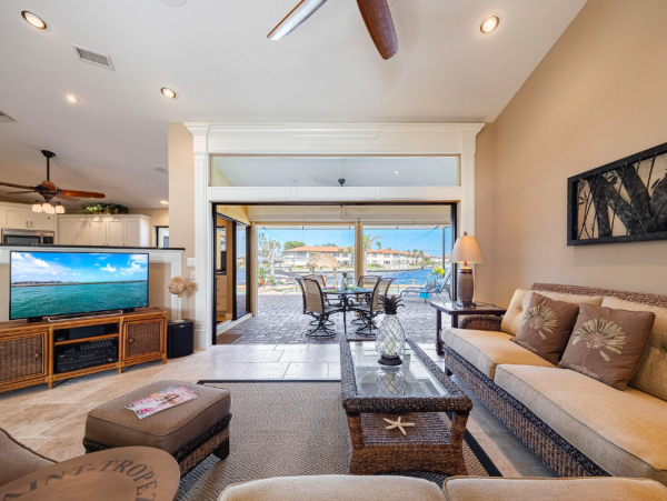 Canal Front Retreat with Gulf Access, Pool, and Tiki Dock in Cape Coral