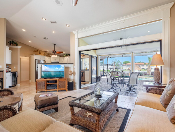 Canal Front Retreat with Gulf Access, Pool, and Tiki Dock in Cape Coral