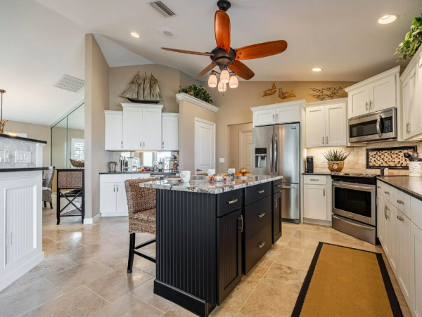 Canal Front Retreat with Gulf Access, Pool, and Tiki Dock in Cape Coral