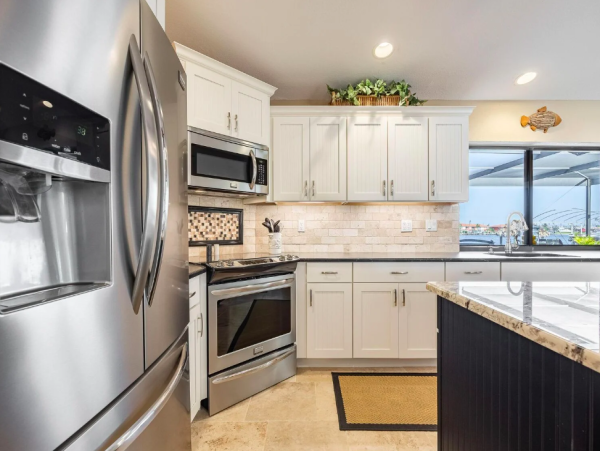 Canal Front Retreat with Gulf Access, Pool, and Tiki Dock in Cape Coral