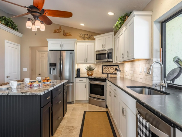 Canal Front Retreat with Gulf Access, Pool, and Tiki Dock in Cape Coral