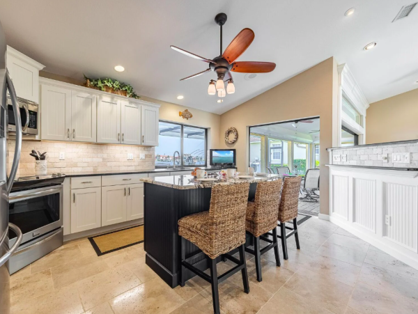 Canal Front Retreat with Gulf Access, Pool, and Tiki Dock in Cape Coral