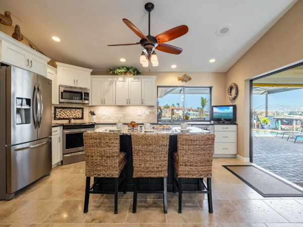 Canal Front Retreat with Gulf Access, Pool, and Tiki Dock in Cape Coral