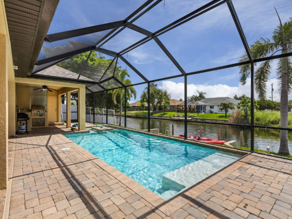 Cape Coral Getaway: Canal Views, Pool, and Modern Comfort