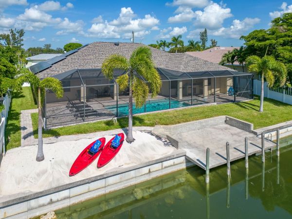 Cape Coral Getaway: Canal Views, Pool, and Modern Comfort