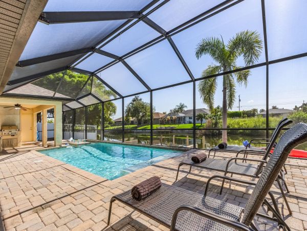 Cape Coral Getaway: Canal Views, Pool, and Modern Comfort