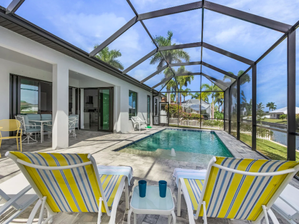 Cape Coral Coastal Elegance Retreat with Caged Pool and Scenic Views