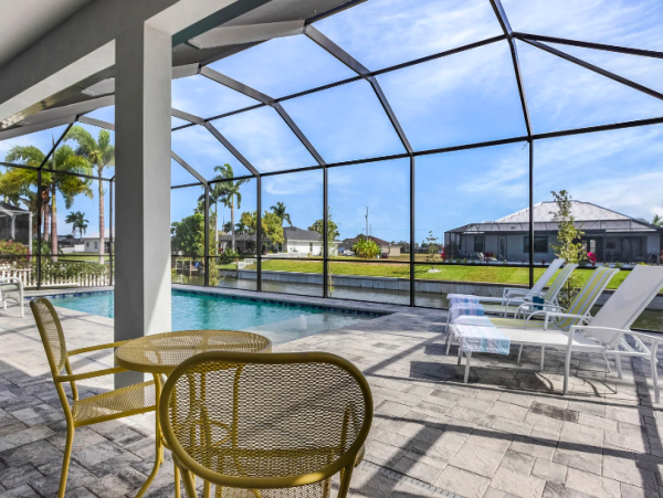 Cape Coral Coastal Elegance Retreat with Caged Pool and Scenic Views