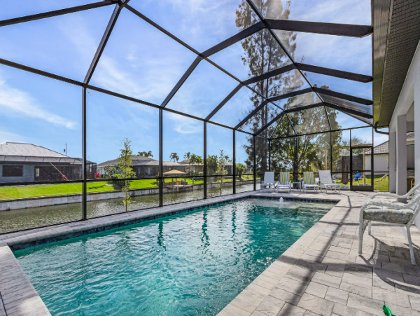Cape Coral Coastal Elegance Retreat with Caged Pool and Scenic Views