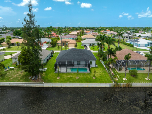 Cape Coral Coastal Elegance Retreat with Caged Pool and Scenic Views