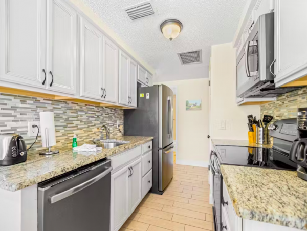 Full Duplex with Separate Outdoor Areas & Walking Distance to Beach