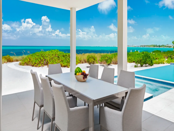 Luxurious Oasis: 13-Bedroom Beachfront Villa with a Pool in Turks and Caicos