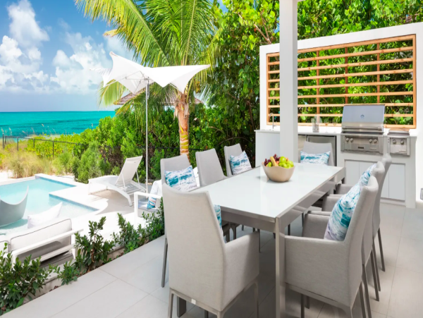 Luxurious Oasis: 13-Bedroom Beachfront Villa with a Pool in Turks and Caicos