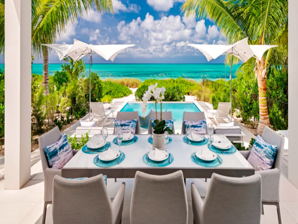 Luxurious Oasis: 13-Bedroom Beachfront Villa with a Pool in Turks and Caicos