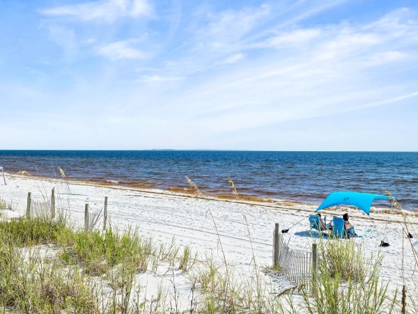 Luxurious Beachfront Retreat with Pool, Direct Access to Beach, and Exclusive Amenities