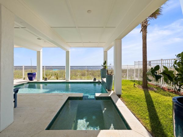 Luxurious Beachfront Retreat with Pool, Direct Access to Beach, and Exclusive Amenities