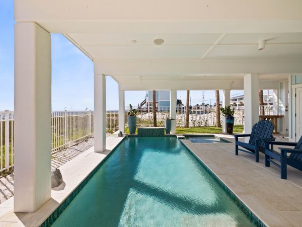 Luxurious Beachfront Retreat with Pool, Direct Access to Beach, and Exclusive Amenities