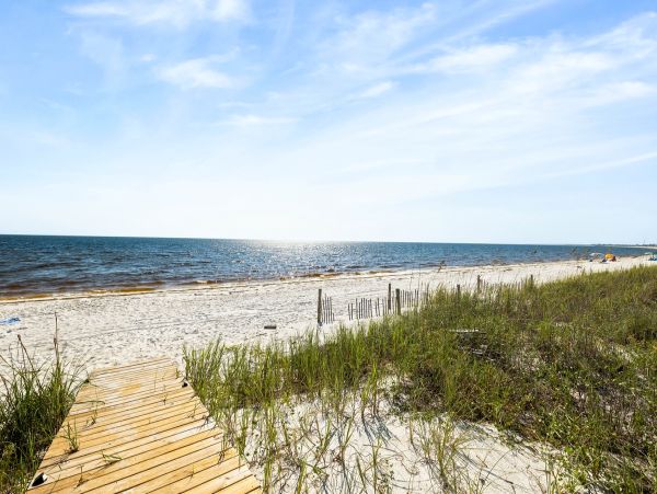 Luxurious Beachfront Retreat with Pool, Direct Access to Beach, and Exclusive Amenities