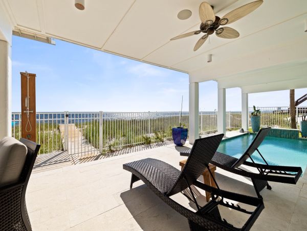 Luxurious Beachfront Retreat with Pool, Direct Access to Beach, and Exclusive Amenities