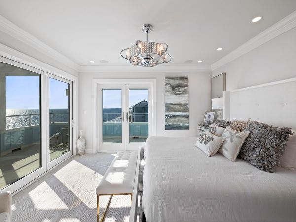 Luxurious Beachfront Retreat with Pool, Direct Access to Beach, and Exclusive Amenities