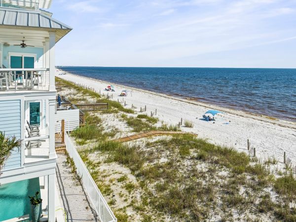 Luxurious Beachfront Retreat with Pool, Direct Access to Beach, and Exclusive Amenities