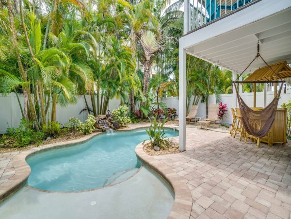 Holmes Beach Vacation Pool Home Four Bedrooms Walk to Beach