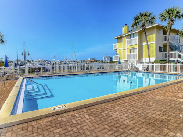 Inviting Destin Condo with Dock Pool Hot Tub & Private Beach