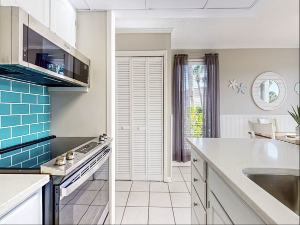 Inviting Destin Condo with Dock Pool Hot Tub & Private Beach