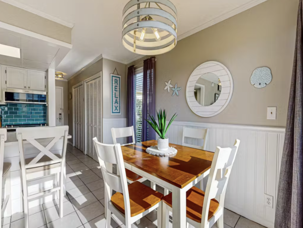 Inviting Destin Condo with Dock Pool Hot Tub & Private Beach