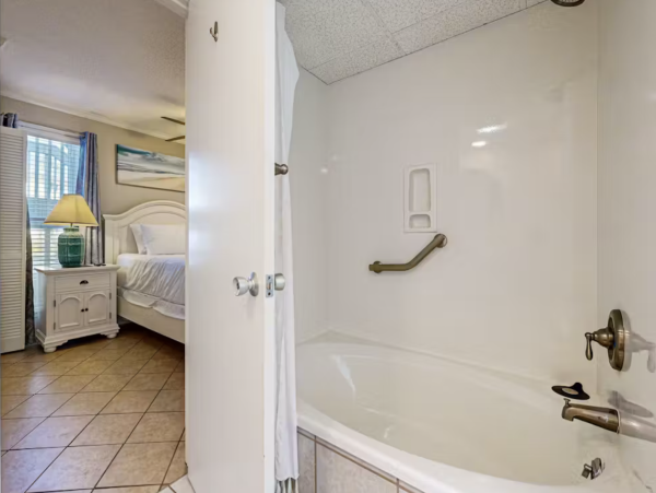Inviting Destin Condo with Dock Pool Hot Tub & Private Beach