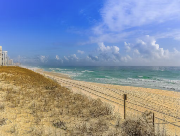 Inviting Destin Condo with Dock Pool Hot Tub & Private Beach
