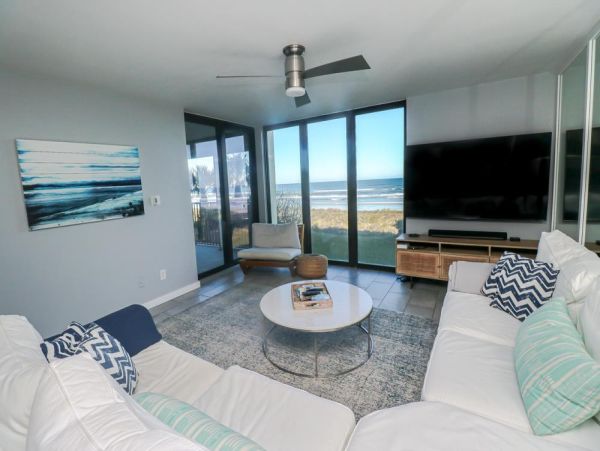 Elegant Oceanfront Condo with Panoramic Views and Upscale Comfort