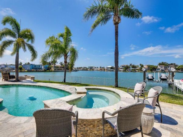 Luxury St. Petersburg Waterfront Vacation Rental 5-Bedroom Home with Pool, Spa & Dock Near Treasure Island